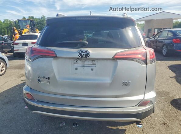 2T3RFREV8GW474301 2016 TOYOTA RAV4 Silver Widok z tyłu