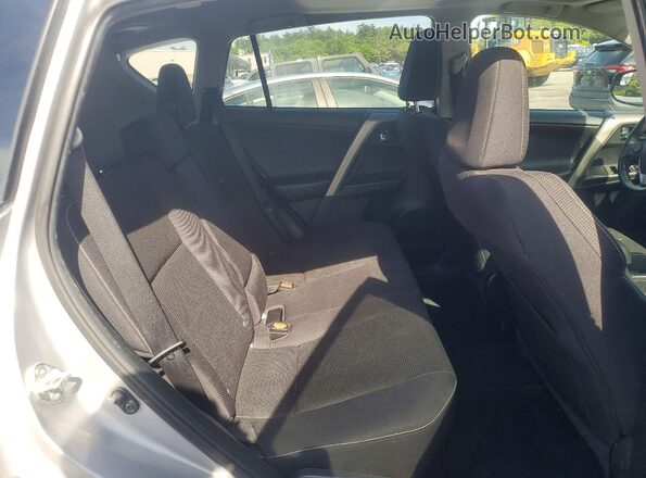 2T3RFREV8GW474301 2016 TOYOTA RAV4 Silver Widok wnętrza z tyłu