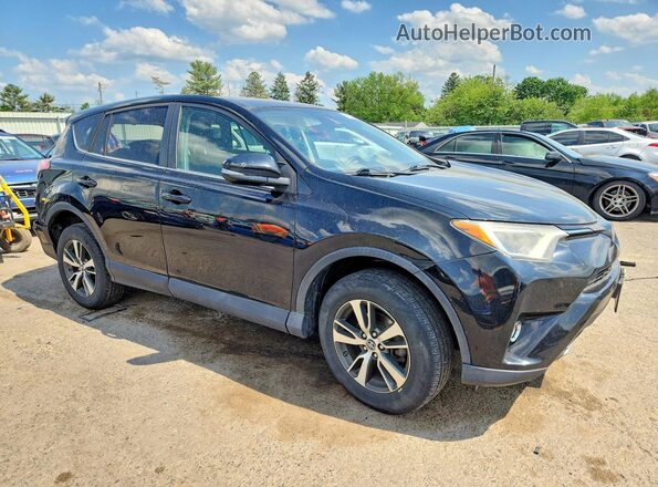 2T3RFREV8JW706080 2018 TOYOTA RAV4 Black Przód prawy