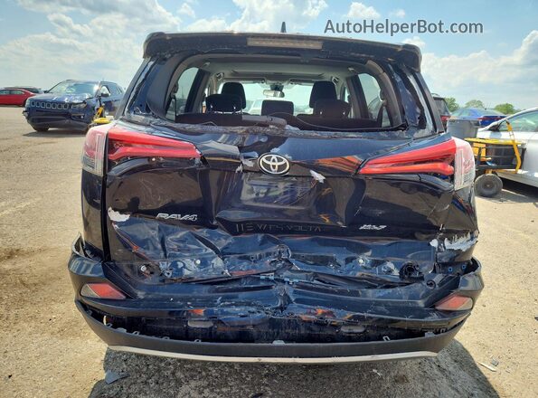 2T3RFREV8JW706080 2018 TOYOTA RAV4 Black Widok z tyłu