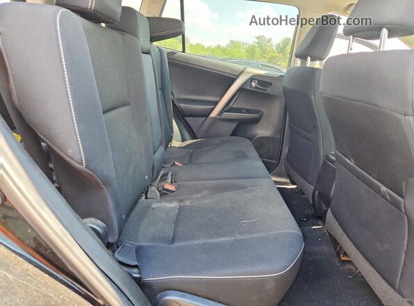 2T3RFREV8JW706080 2018 TOYOTA RAV4 Black Widok wnętrza z tyłu