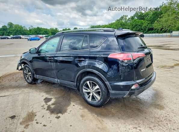 2T3RFREV8JW831886 2018 TOYOTA RAV4 Black Rear left