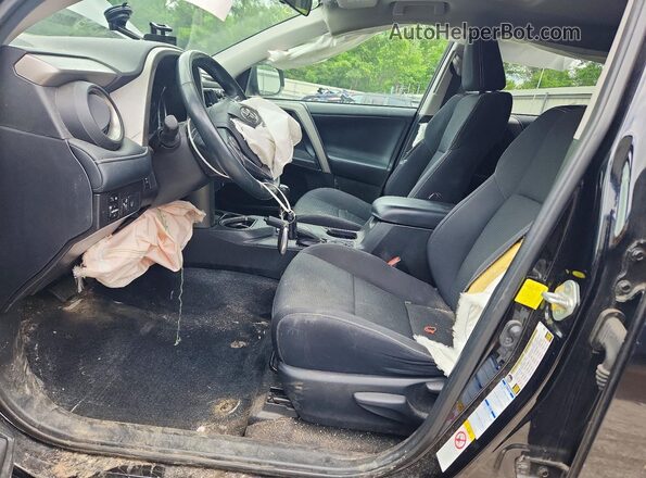 2T3RFREV8JW831886 2018 TOYOTA RAV4 Black Front interior view