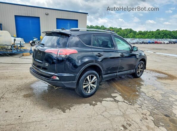 2T3RFREV8JW831886 2018 TOYOTA RAV4 Black Rear right