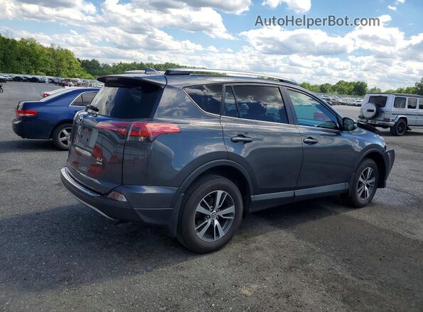 2T3RFREV8JW832066 2018 TOYOTA RAV4 Gray Trasero derecho
