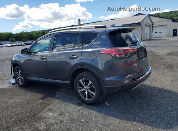 2T3RFREV8JW832066 2018 TOYOTA RAV4 Gray Trasero izquierdo