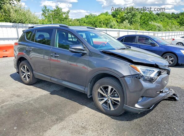 2T3RFREV8JW832066 2018 TOYOTA RAV4 Gray Delantero derecho