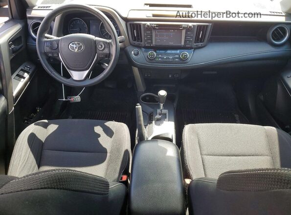 2T3RFREV8JW832066 2018 TOYOTA RAV4 Gray Vista del salpicadero