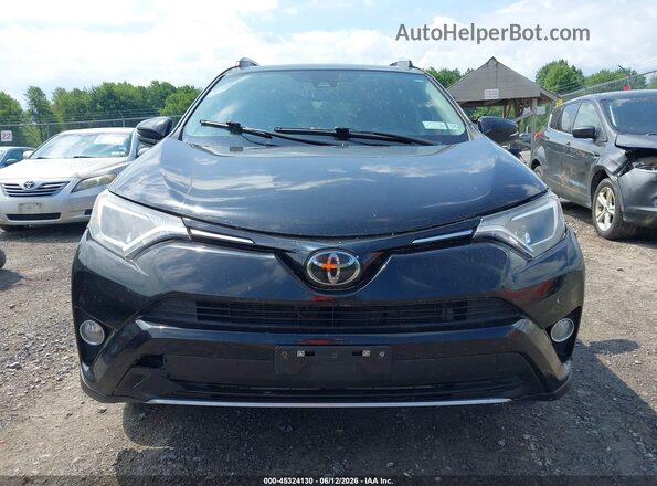2T3RFREV8JW840037 2018 TOYOTA RAV4 Black Սալոնի հետևի տեսք