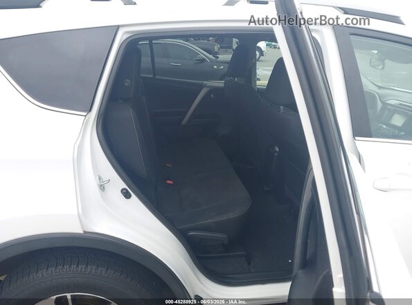 2T3RFREV9HW603471 2017 TOYOTA RAV4 White VIN კოდის სტიკერის ხედი