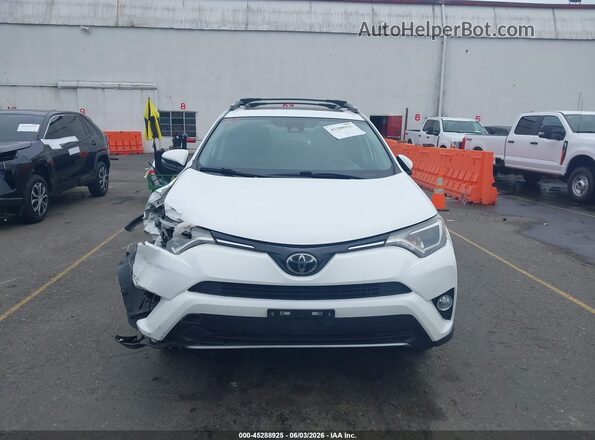 2T3RFREV9HW603471 2017 TOYOTA RAV4 White ხელსაწყოთა პანელის ხედი