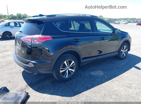 2T3RFREV9JW713233 2018 TOYOTA RAV4 Black Задня права чверть
