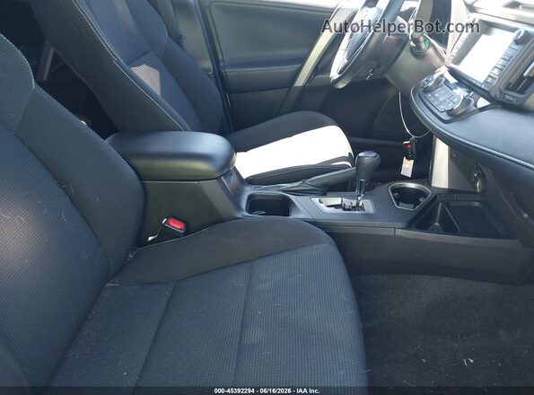 2T3RFREV9JW713233 2018 TOYOTA RAV4 Black Вид салону спереду