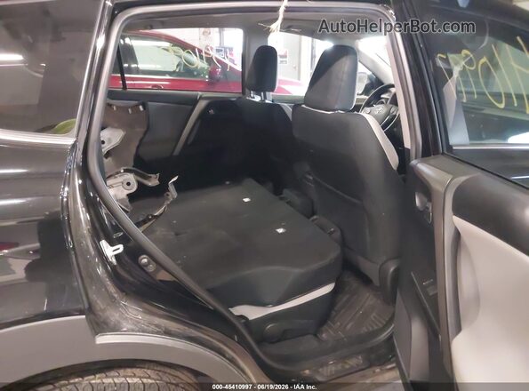 2T3RFREV9JW740576 2018 TOYOTA RAV4 Black Vista de la etiqueta del VIN