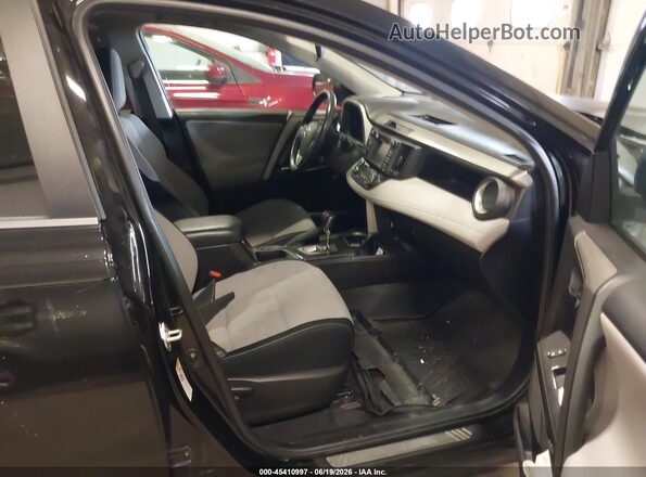 2T3RFREV9JW740576 2018 TOYOTA RAV4 Black Vista interior delantera