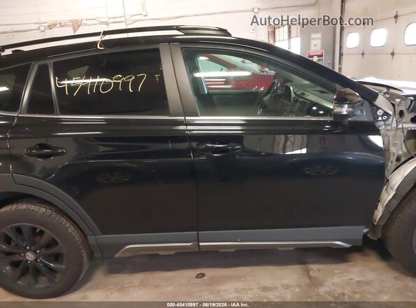 2T3RFREV9JW740576 2018 TOYOTA RAV4 Black Vista interior trasera
