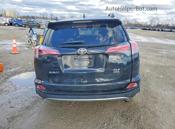 2T3RFREV9JW749732 2018 TOYOTA RAV4 Black უკანა ხედი