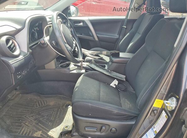2T3RFREV9JW774971 2018 TOYOTA RAV4 Gray Vista interior delantera