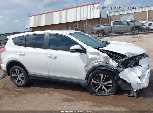 2T3RFREV9JW800775 2018 TOYOTA RAV4 White Widok wnętrza z tyłu