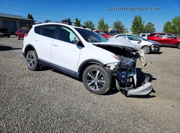 2T3RFREV9JW839138 2018 TOYOTA RAV4 Белый Передняя правая четверть