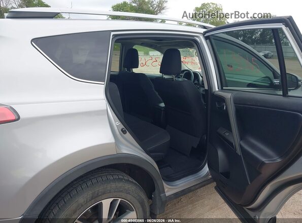 2T3RFREVXHW569007 2017 TOYOTA RAV4 Silver Widok naklejki z numerem VIN