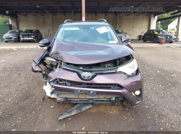 2T3RFREVXHW654154 2017 TOYOTA RAV4 Burgundy Rear interior view