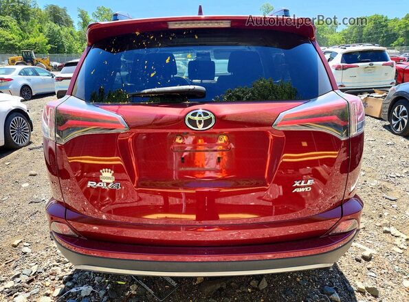 2T3RFREVXJW722572 2018 TOYOTA RAV4 Red Rear view