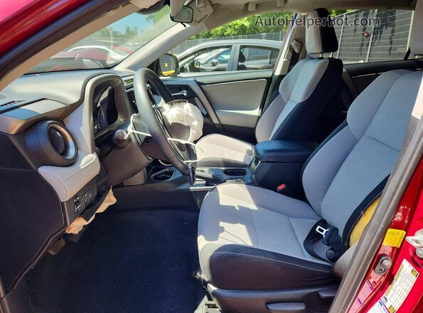 2T3RFREVXJW722572 2018 TOYOTA RAV4 Red Front interior view