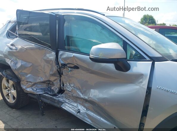 2T3RWRFV7KW011881 2019 TOYOTA RAV4 HYBRID Silver Front view