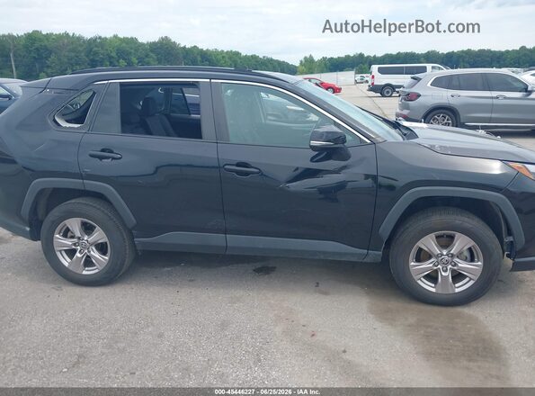 2T3W1RFV3NW226065 2022 TOYOTA RAV4 Black Vista interior trasera