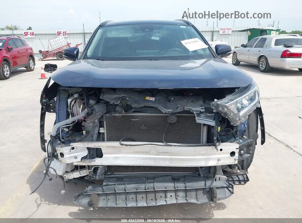 2T3W1RFV9MW162855 2021 TOYOTA RAV4 Dark Blue Vista interior trasera
