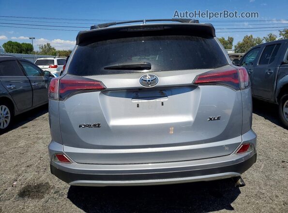 2T3WFREV0GW287136 2016 TOYOTA RAV4 Silver Вид ззаду