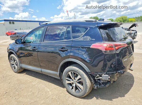 2T3WFREV0GW289968 2016 TOYOTA RAV4 Black Rear left