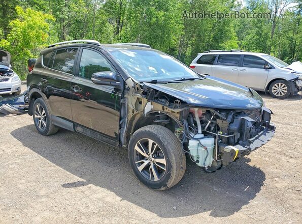 2T3WFREV0GW289968 2016 TOYOTA RAV4 Black Front right