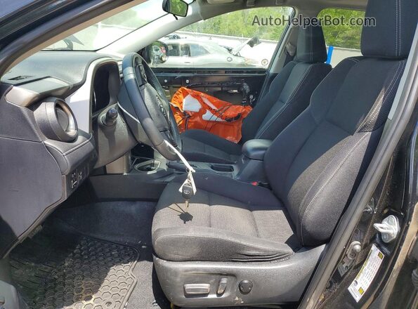 2T3WFREV0GW289968 2016 TOYOTA RAV4 Black Front interior view