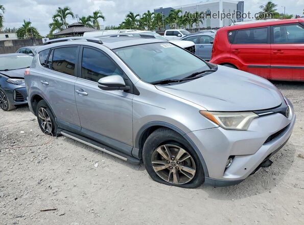 2T3WFREV0HW364640 2017 TOYOTA RAV4 Gray Передня права чверть