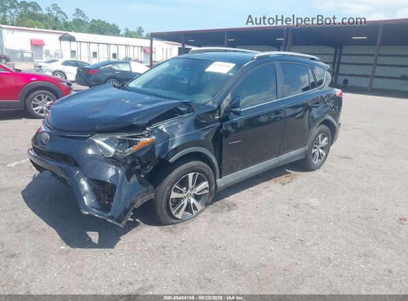 2T3WFREV0HW382037 2017 TOYOTA RAV4 Черный Передняя левая четверть