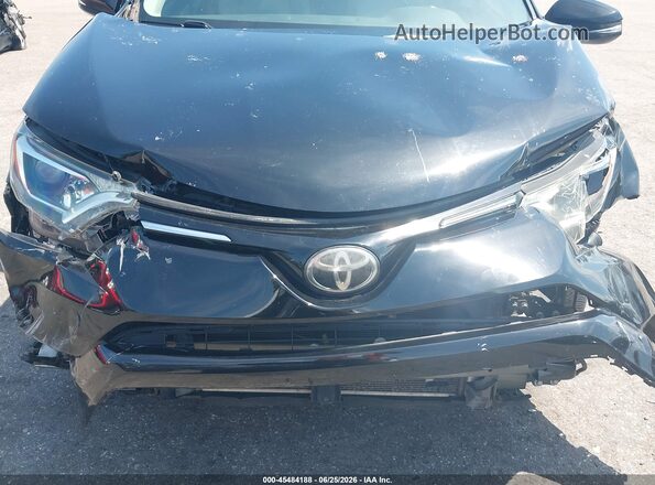 2T3WFREV0HW382037 2017 TOYOTA RAV4 Черный Вид щитка приборов