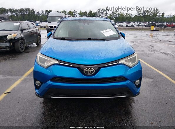 2T3WFREV0HW387383 2017 TOYOTA RAV4 Blue უკანა სალონის ხედი