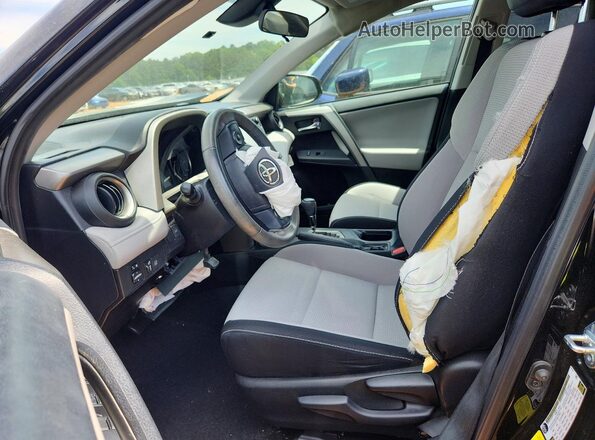 2T3WFREV0JW431419 2018 TOYOTA RAV4 Black Front interior view