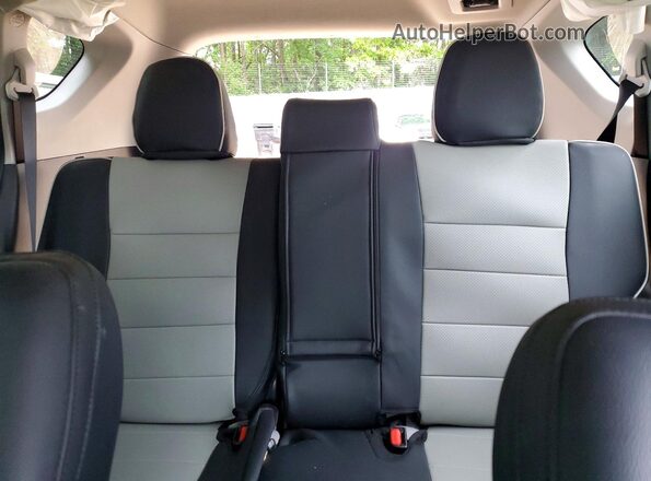 2T3WFREV0JW431419 2018 TOYOTA RAV4 Black Rear seats view