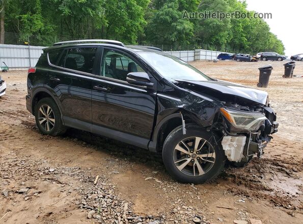 2T3WFREV0JW431419 2018 TOYOTA RAV4 Black Front right