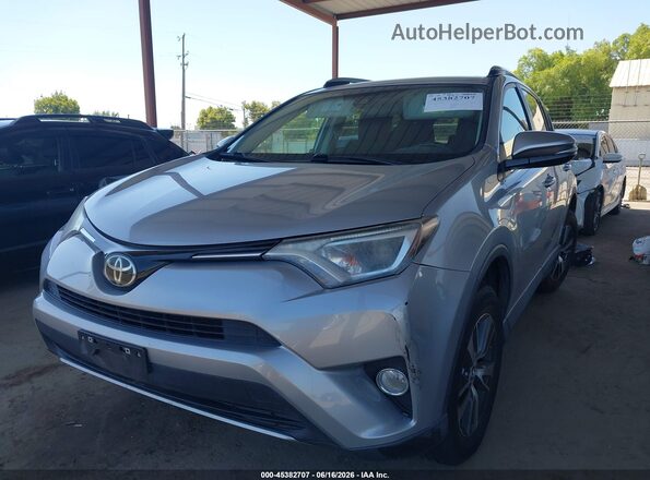 2T3WFREV0JW439052 2018 TOYOTA RAV4 Silver წინა მარცხენა ხედი სამი მეოთხედიდან