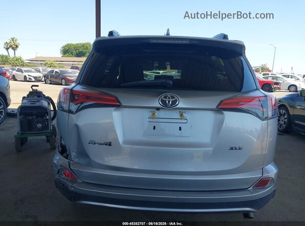 2T3WFREV0JW439052 2018 TOYOTA RAV4 Silver 