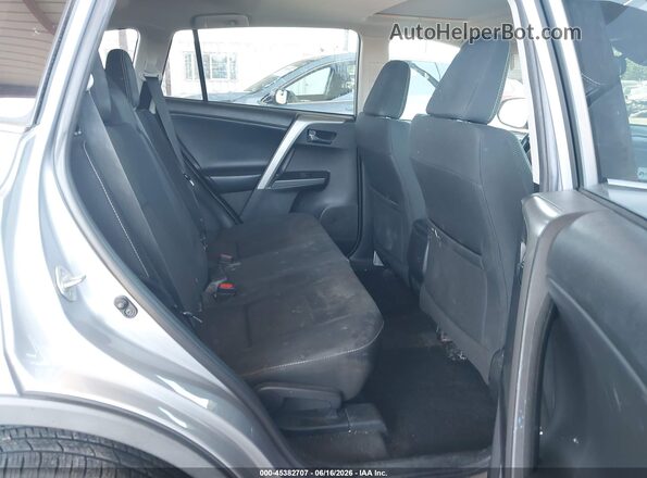 2T3WFREV0JW439052 2018 TOYOTA RAV4 Silver VIN კოდის სტიკერის ხედი