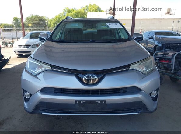 2T3WFREV0JW439052 2018 TOYOTA RAV4 Silver ხელსაწყოთა პანელის ხედი