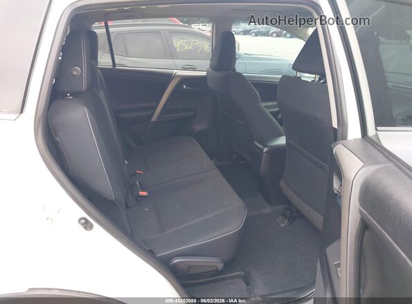 2T3WFREV0JW458197 2018 TOYOTA RAV4 White Widok naklejki z numerem VIN