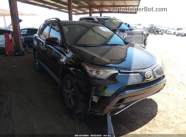 2T3WFREV1JW473484 2018 TOYOTA RAV4 Black Widok z przodu