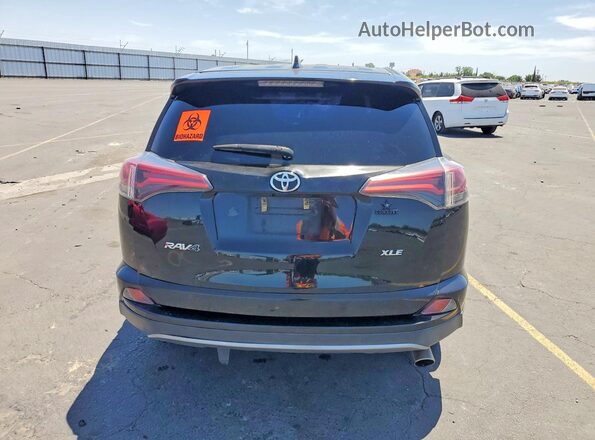 2T3WFREV1JW476479 2018 TOYOTA RAV4 Black Вид ззаду