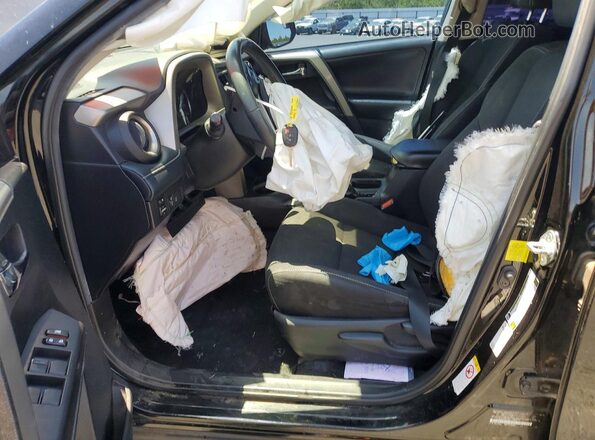 2T3WFREV1JW476479 2018 TOYOTA RAV4 Black Вид салону спереду